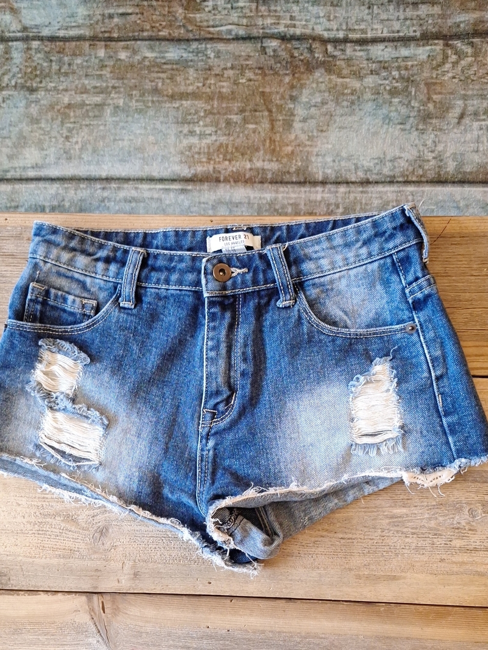 🔥🔥CLEARANCE ITEM🔥Forever 21 Distressed Blue Denim Cutoff Shorts. Size 25